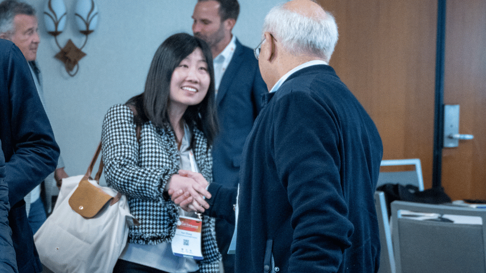 Conference attendees networking at World CNS Korea