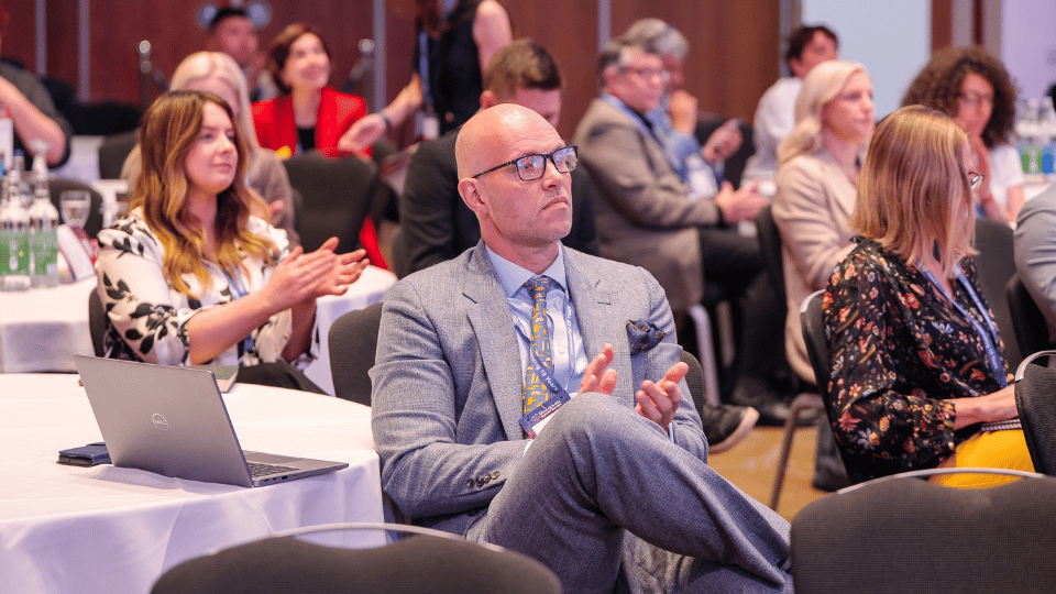 Conference audience attending neuroscience presentations