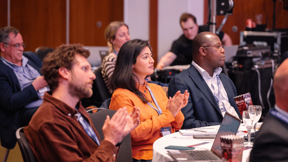 Conference audience attending neuroscience presentations